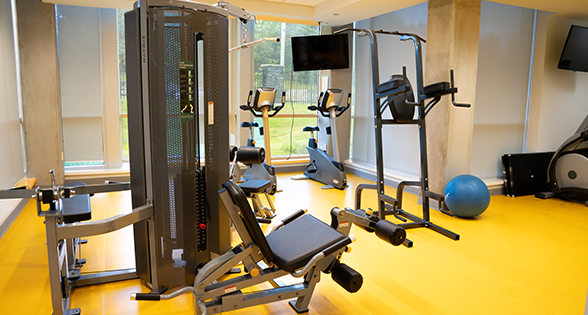 Gym showing multiple exercise equipment