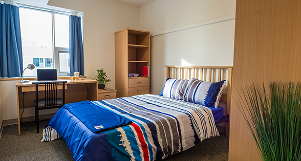 London Hall room looking at bed and desk